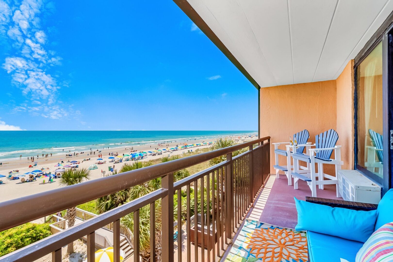 A condo balcony near a beach
